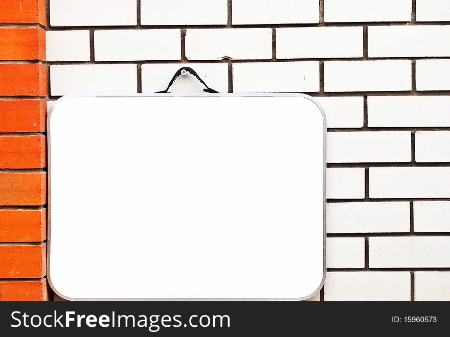 Large billboard with blank white paper ready for text.