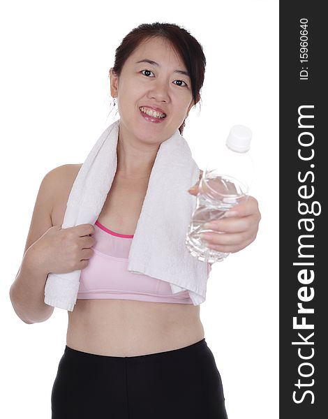 An Asian woman in fitness attire offering a bottle of water. An Asian woman in fitness attire offering a bottle of water