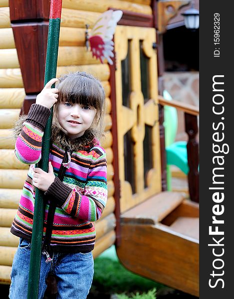 Adorable Preschooler Girl On Playground