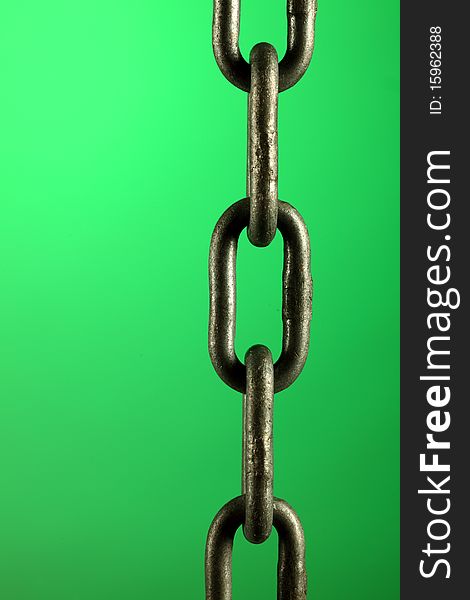 A chain isolated on green background