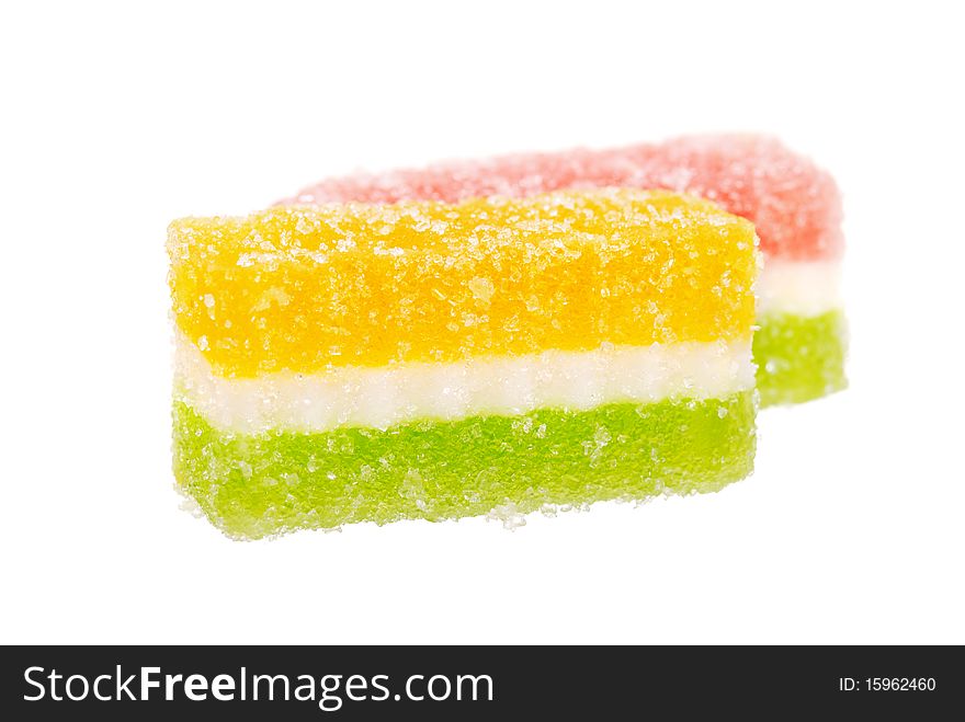 Fruit candy slices on the isolated white. Fruit candy slices on the isolated white