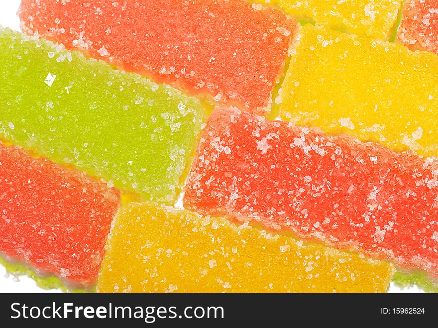 Fruit candy slices on the isolated white. Fruit candy slices on the isolated white