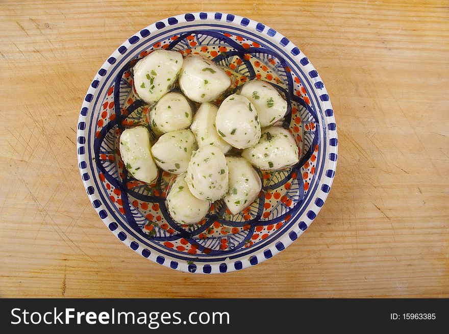 Oil and chives marinated bocconcini cheese balls