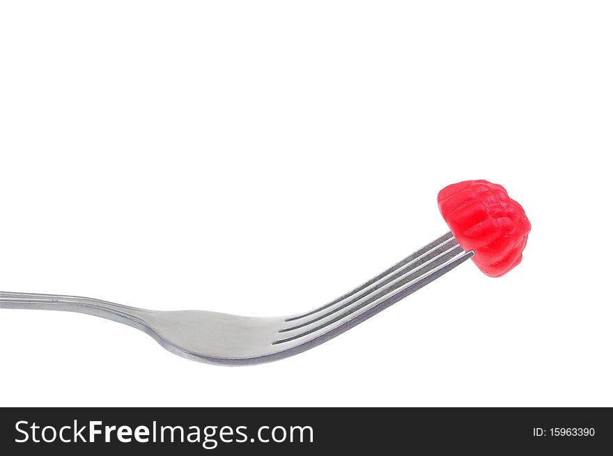 Jelly lolly on fork isolated over white