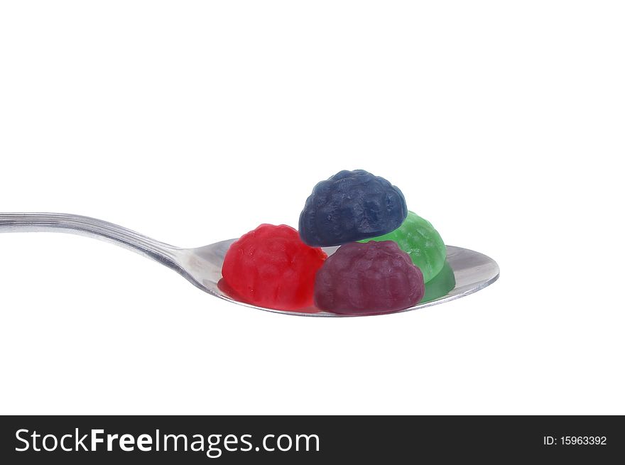 Jelly lolly on spoon isolated over white