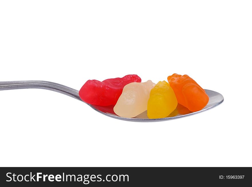 Jelly lolly on spoon isolated over white