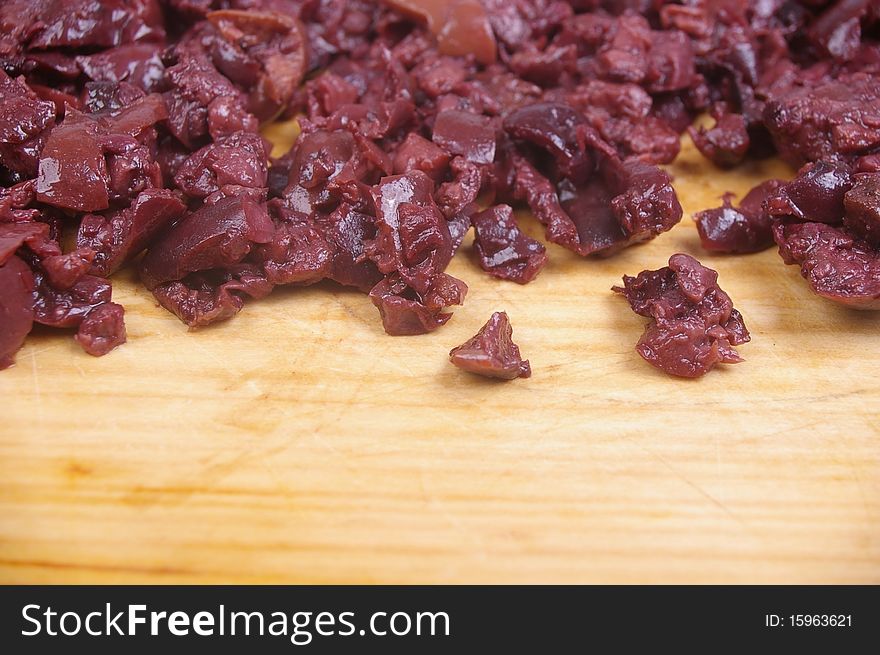 Ripe black kalamata olives minced for dip