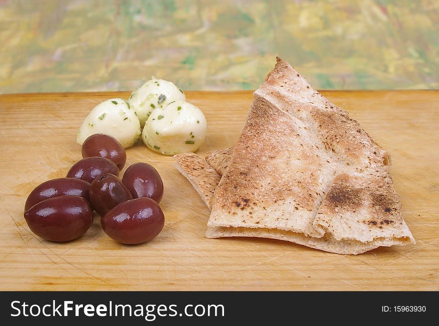 Chived bocconcini cheese and black kalamata olives. Chived bocconcini cheese and black kalamata olives