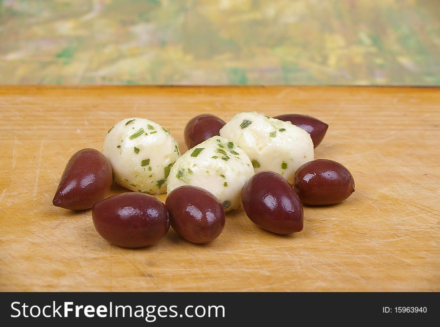 Chived bocconcini cheese and black kalamata olives. Chived bocconcini cheese and black kalamata olives