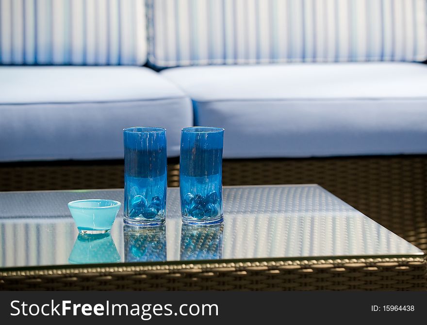 A blue table decoration with couch. A blue table decoration with couch