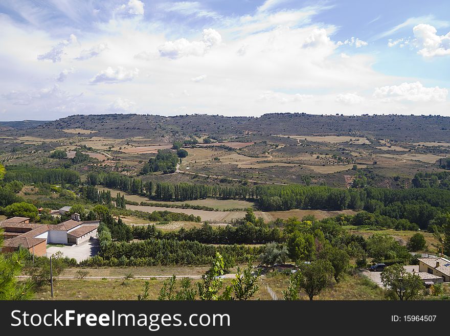 View along the river Tajo, with fields. Brihuega, Spain. View along the river Tajo, with fields. Brihuega, Spain