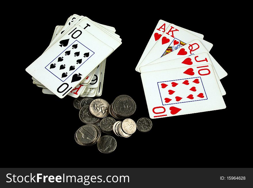 Royal Flush Card Hand with Change Isolated on black. Royal Flush Card Hand with Change Isolated on black