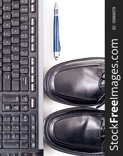 Mens Dress Shoes Toe view with Keyboard and Pen for business fashion and professional concepts. Mens Dress Shoes Toe view with Keyboard and Pen for business fashion and professional concepts