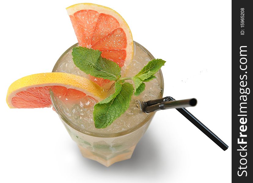 Fruit cocktail in glass with straw