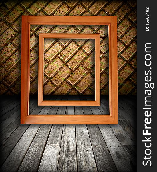 Golden frame on wood background. Golden frame on wood background