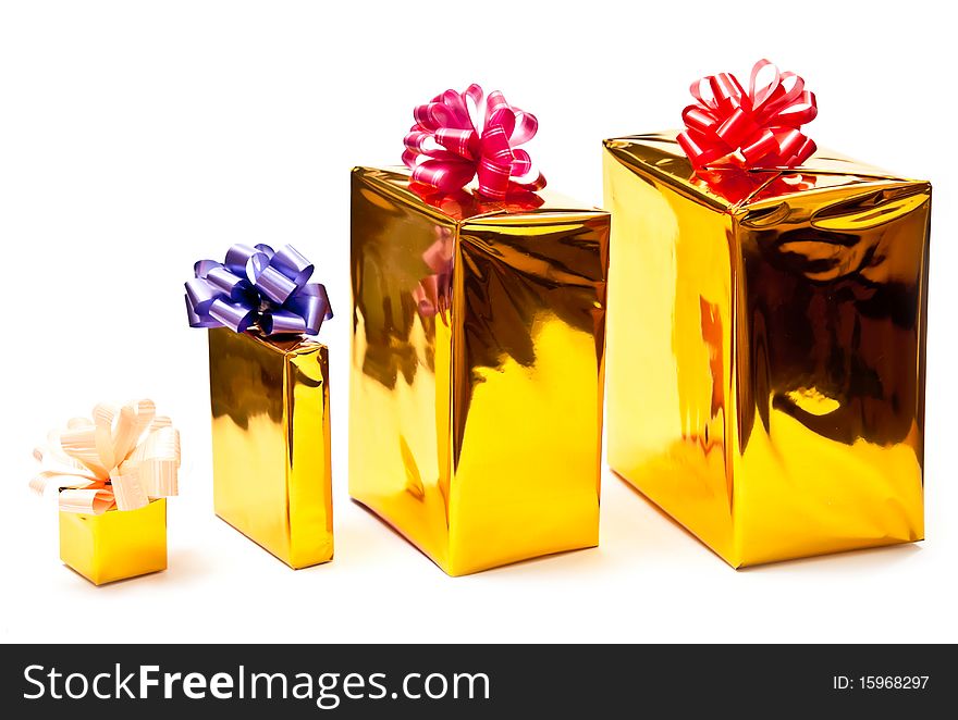 Row from yellow presents with bows. White background. Row from yellow presents with bows. White background