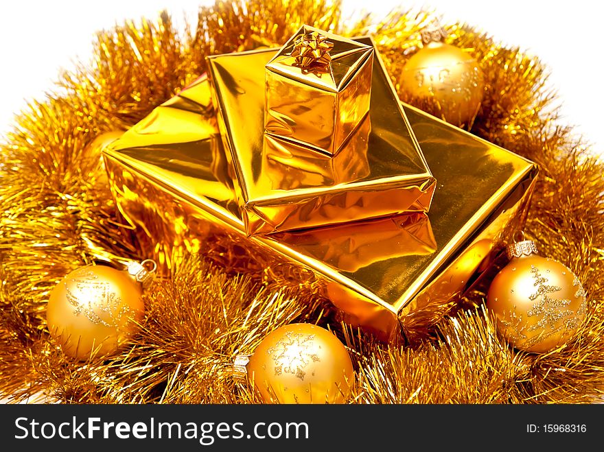 Yellow gifts boxes with christmas balls. Isolated on white. Yellow gifts boxes with christmas balls. Isolated on white