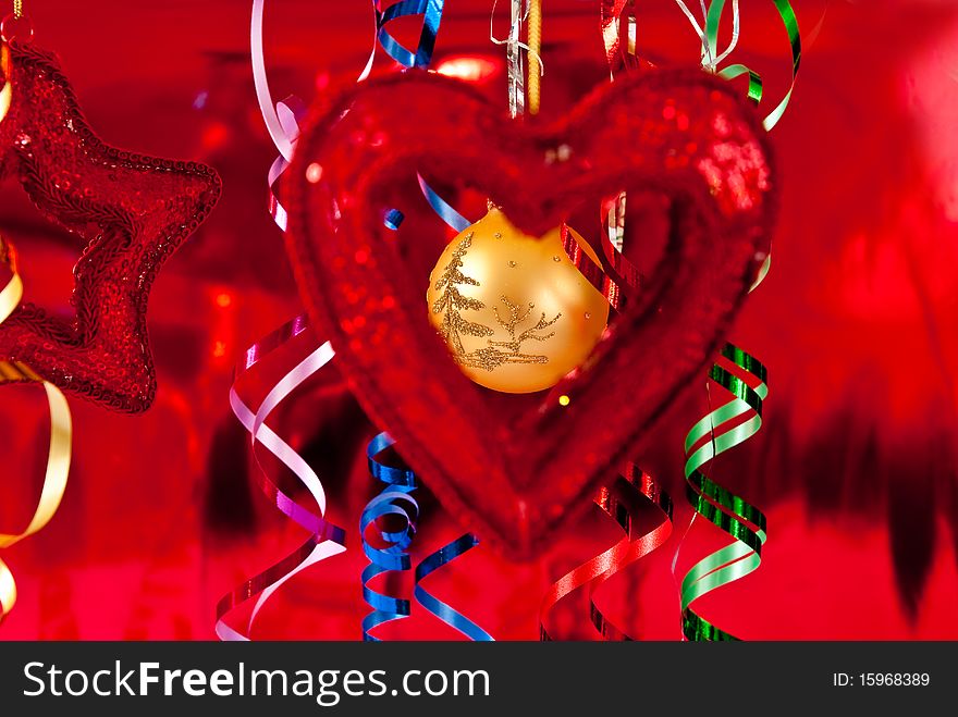 Christmas baubles and ribbons on red background. Christmas baubles and ribbons on red background