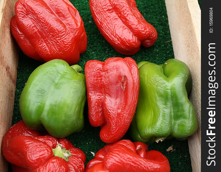 This is a shot of some red and green peppers on display for sale at our local Farmers Market. This is a shot of some red and green peppers on display for sale at our local Farmers Market.