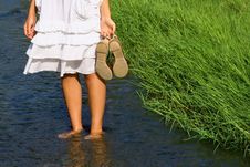 Girl S Legs In The Cool Water Stock Image