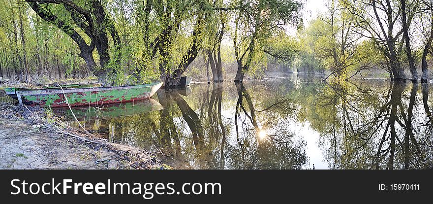 Boat And Water Reflexion