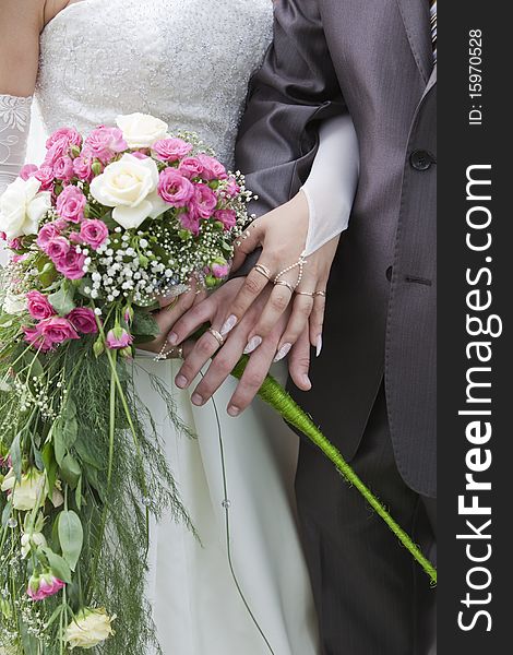 Wedding bouquet in the hands of the bride. Wedding bouquet in the hands of the bride.