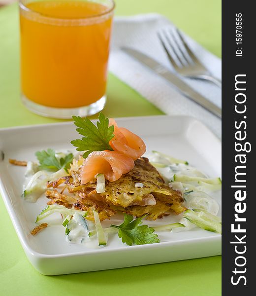 Potato rosti with smoked salmon and sour cream.