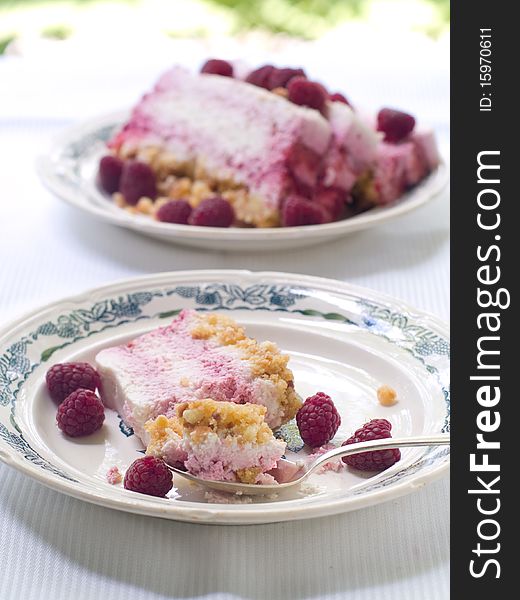 Cheesecake  with raspberry on plate