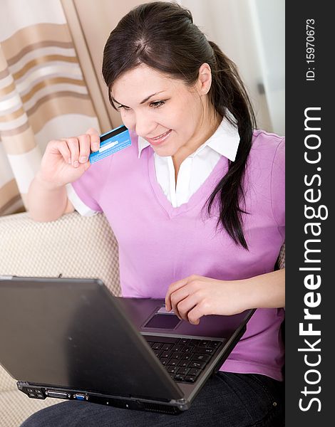Young adult woman buying something online. Young adult woman buying something online