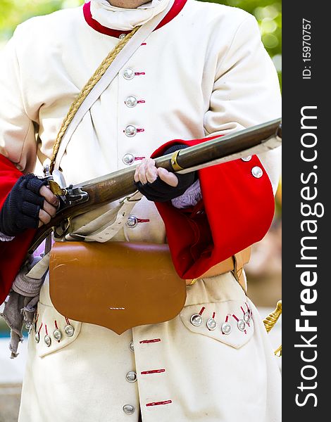 Soldier with carabiner and jacket during the re-enactment of the. Succession  War September 4, 2010 in Brihuega, Spain