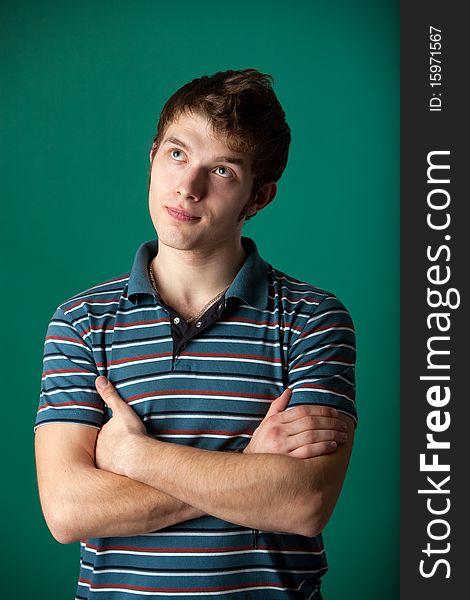 Young guy on a green background
