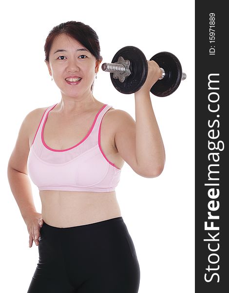 An Asian woman working out with a dumbbell. An Asian woman working out with a dumbbell