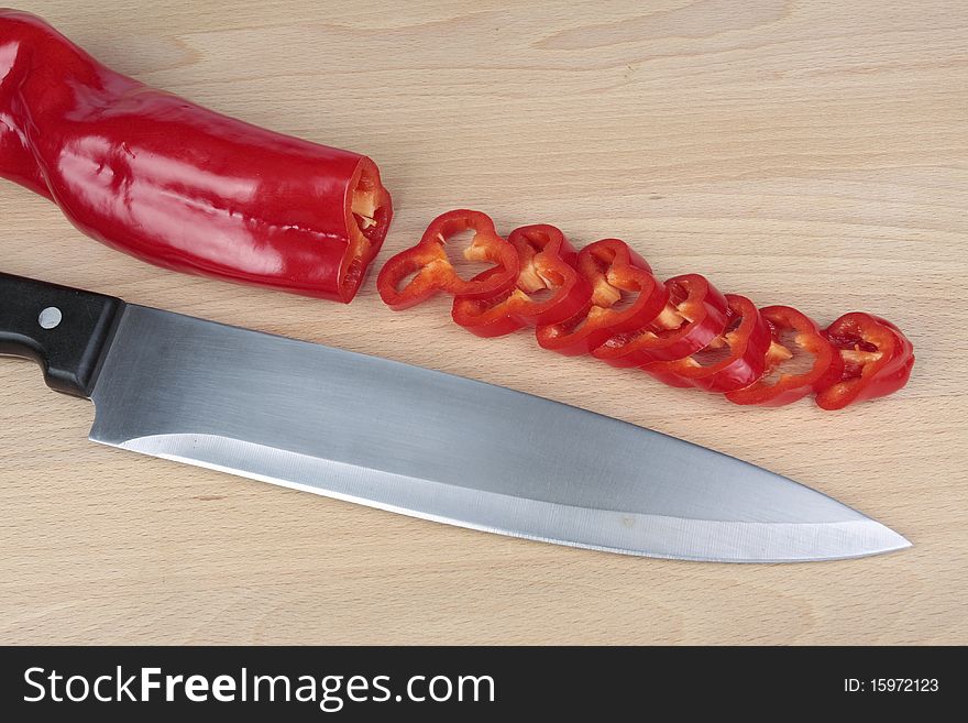 Cut Sweet red peppers and chillies. Cut Sweet red peppers and chillies