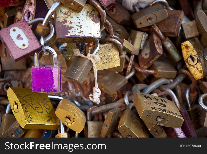 Locks on the bridge, tradition for italian people in love. Locks on the bridge, tradition for italian people in love