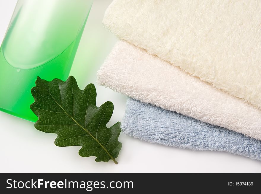 Things for body care and relaxation with oak leaf on white background. Things for body care and relaxation with oak leaf on white background