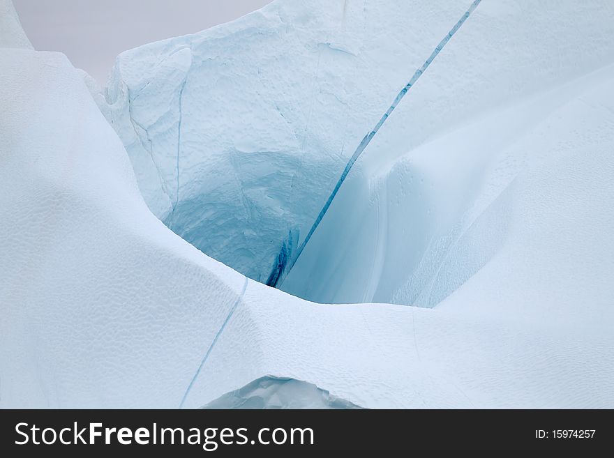 Iceberg in the famous icefjord beside the city of Ilulissat in Greenland. The icefjord is on UNESCO's World Heritage List. Iceberg in the famous icefjord beside the city of Ilulissat in Greenland. The icefjord is on UNESCO's World Heritage List.