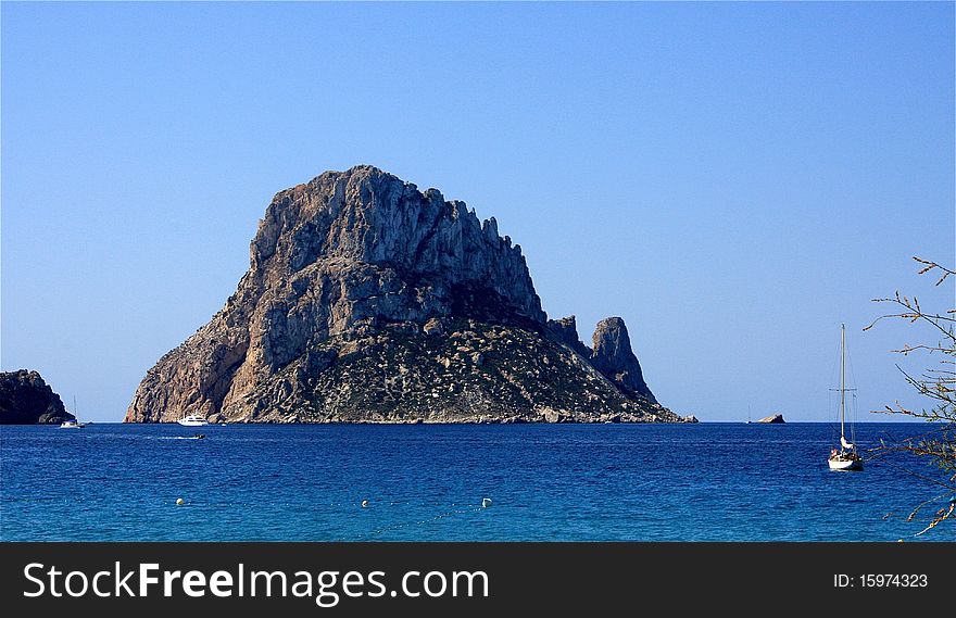 Es Vedra rock on Ibiza from the beach. Es Vedra rock on Ibiza from the beach