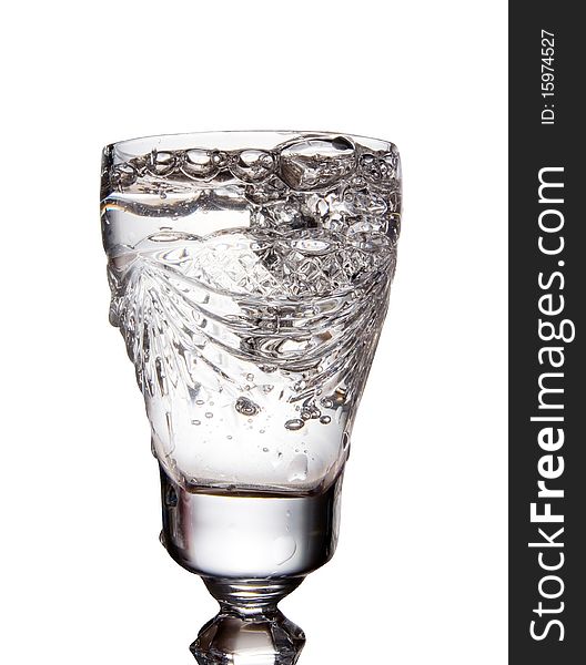 Water in glass isolated background
