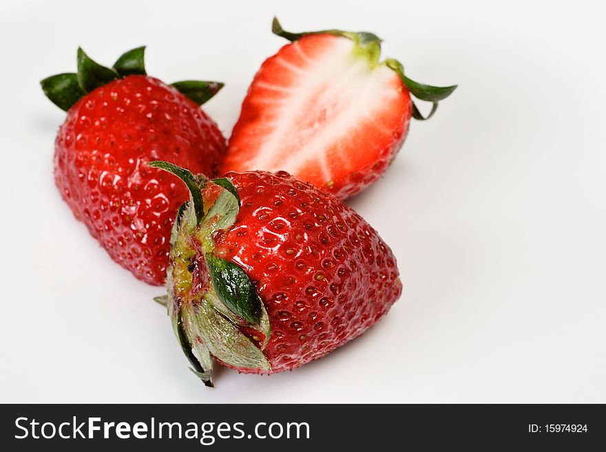 A few of strawberries side by side