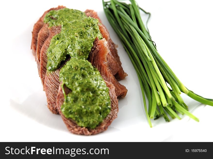 Boiled veal with parsley green sauce