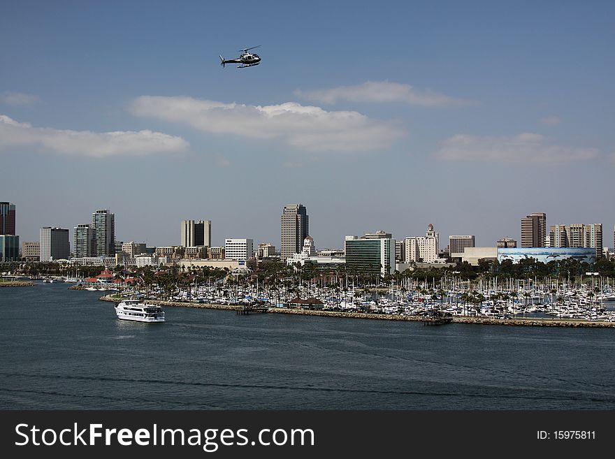 View of harbor in Long Beach California. Port for many cruise ships to pick up travelers and playground for those who love the ocean.