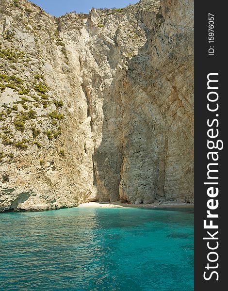 Secluded beach located between some very tall rocks