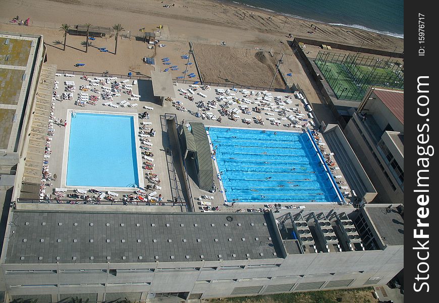 Aerial view of two swimming pools near the sea in spain. Aerial view of two swimming pools near the sea in spain