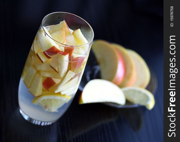 Apple and lemon drink in a glass