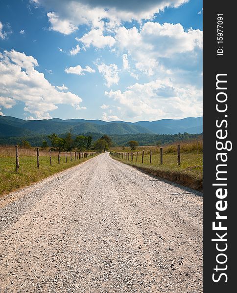 Cades Cove Rural Dirt Road Farm Landscape through summer hay fields