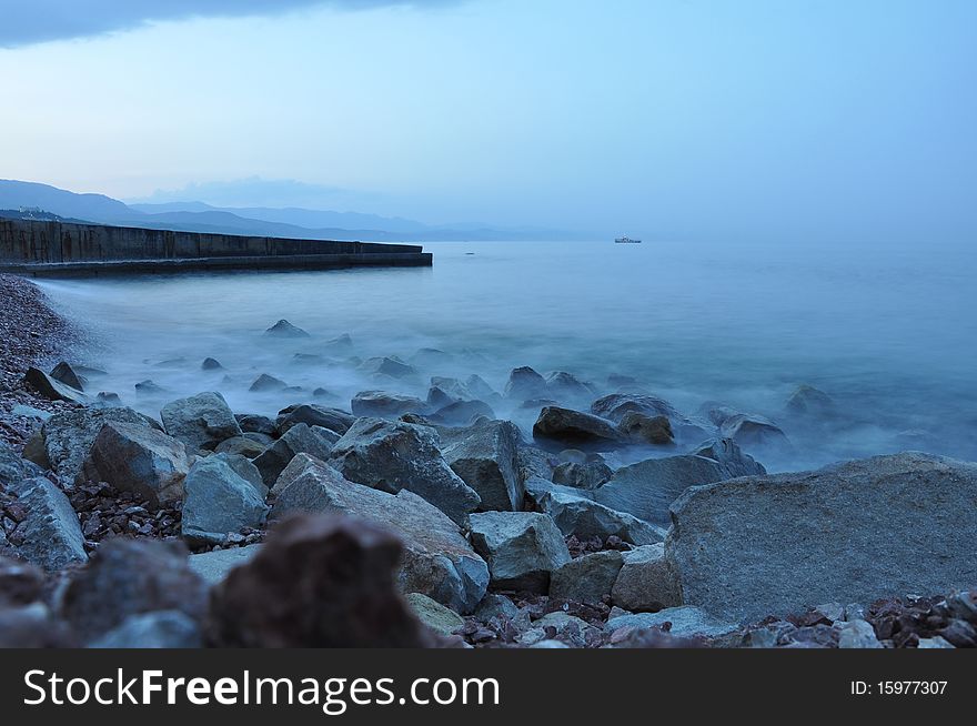 Beutiful seaside with stones on bank