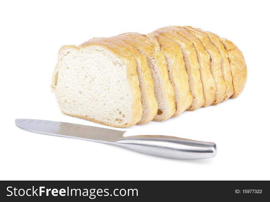 Bread and knife on white background(isolated). Bread and knife on white background(isolated).