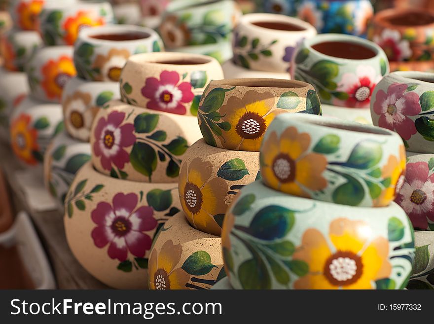 Variety Of Colorfully Painted Ceramic Pots.