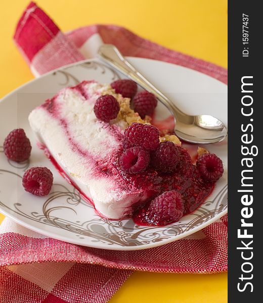 Cheesecake  with raspberry on plate