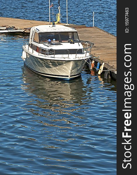 A power boat at a dockside